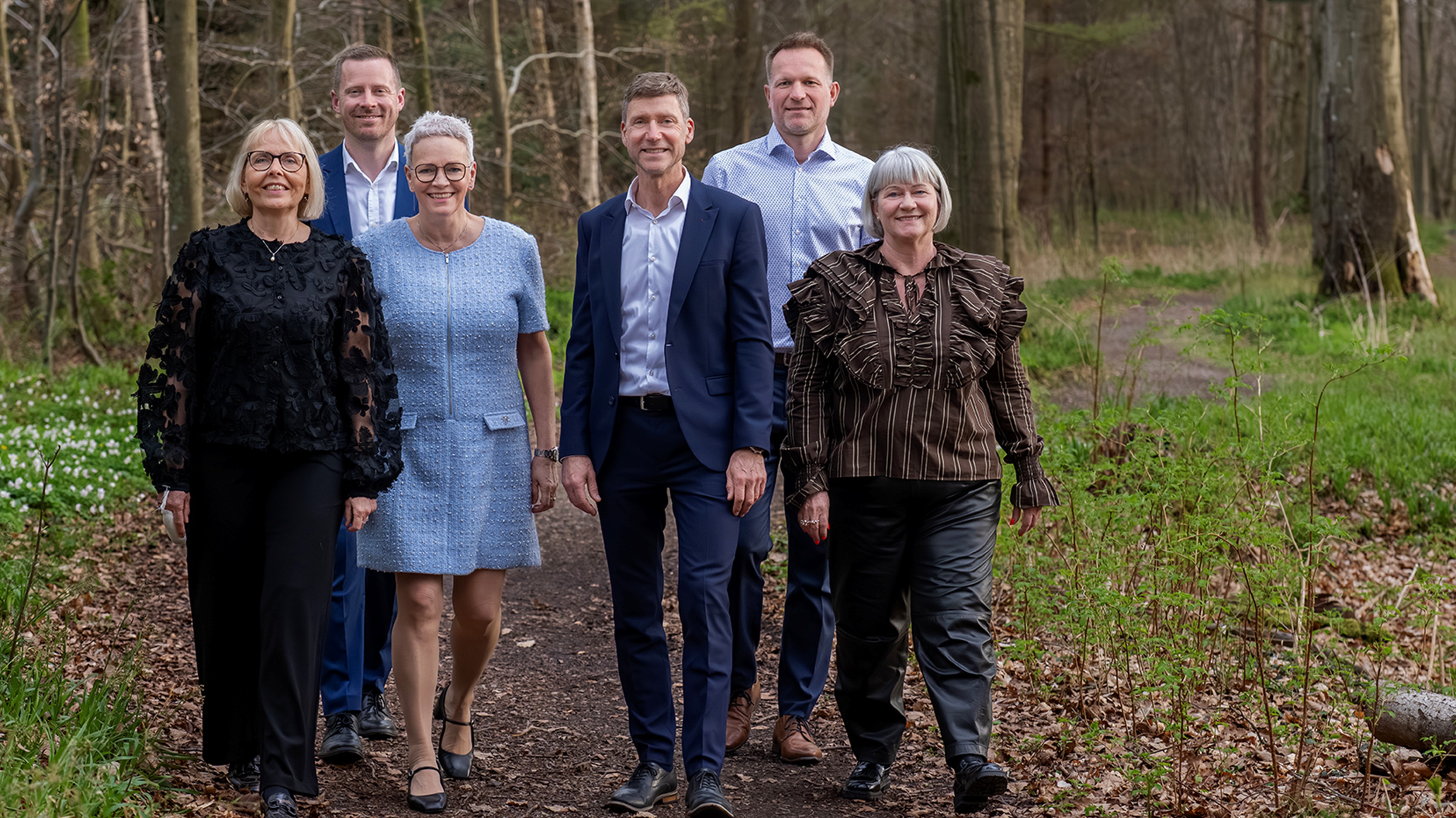 Kredsbestyrelsen samlet fotograferet i en skov